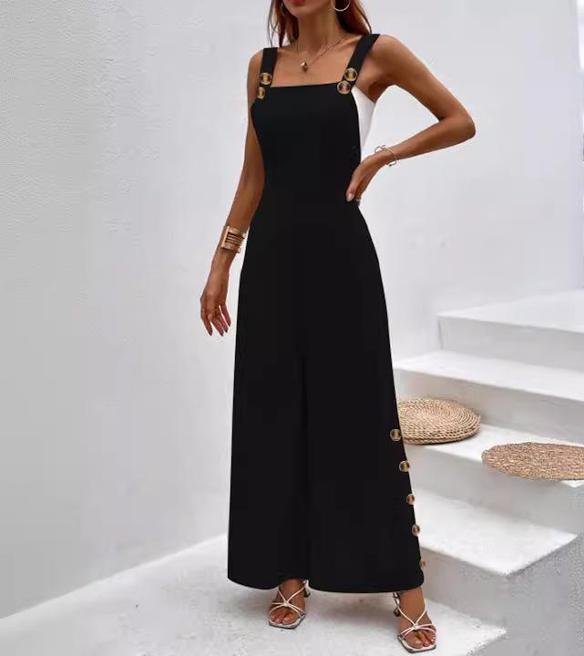 Dame jumpsuit i elegant snit med dekorative knapdetaljer Stilla
