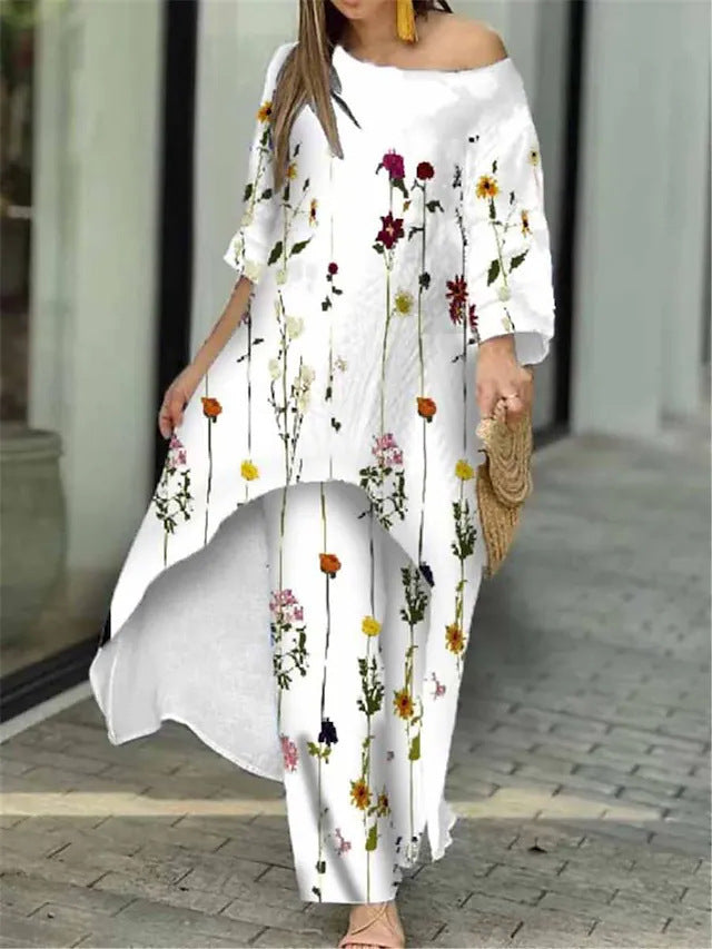 Dame maxikjole med blomsterdesign og asymmetrisk kant Stilla