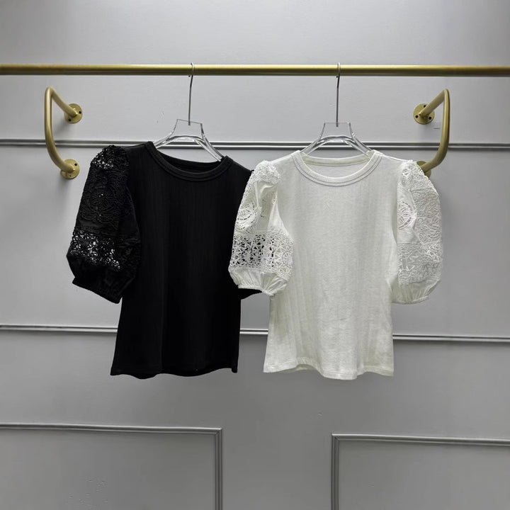 Damebluse med elegante ballonærmer og fine hæklerapplikationer Stilla