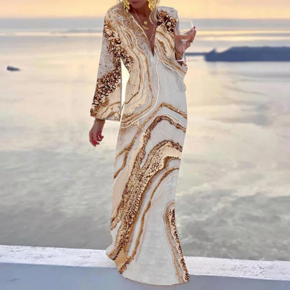 Dame Maxikjole med dyb V-udskæring og elegant fluiddesign Stilla