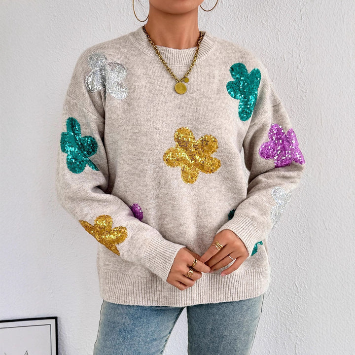 Kvindernes glitrende oversized sweater med blomstermotiv Stilla