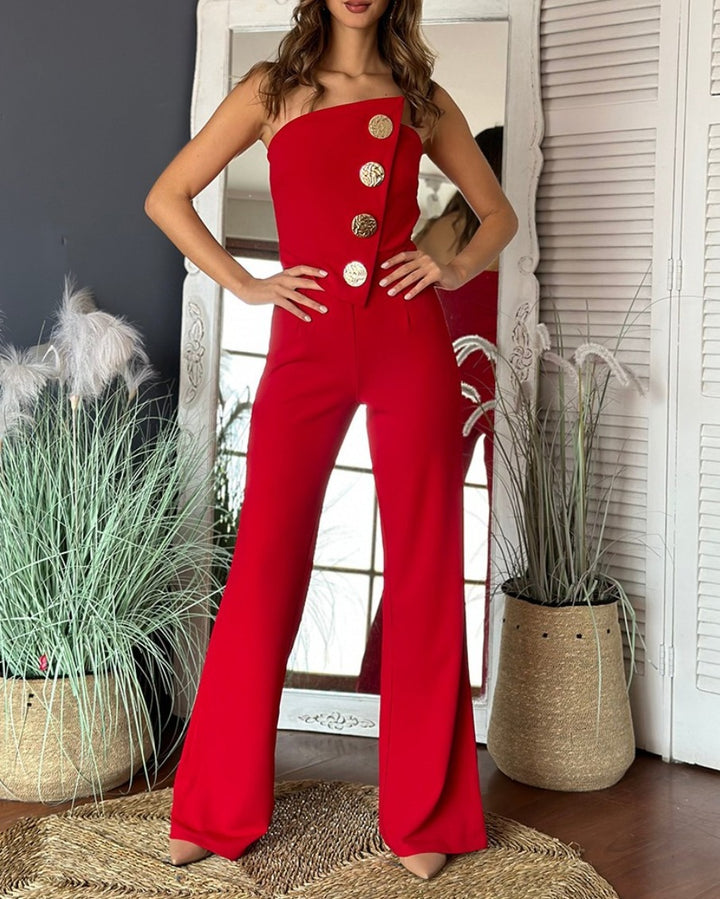 Dame overalls med asymmetrisk snit og dekorative knapper Stilla