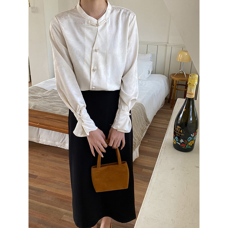 Damer elegant bluse med knapdetaljer og ekstravagant krave Stilla