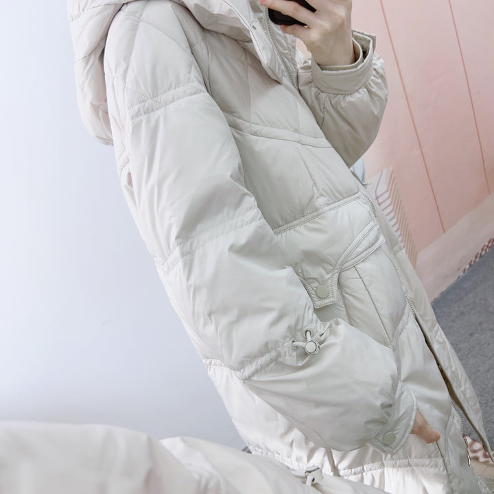 Dame Lang foret quilted jakke med aftagelig hætte og praktiske lommer Stilla