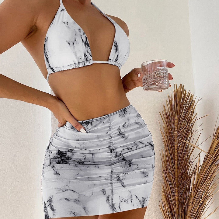 Dame triangel-bikini med moderigtig indpakningsnederdel og elegant marmor mønster Stilla