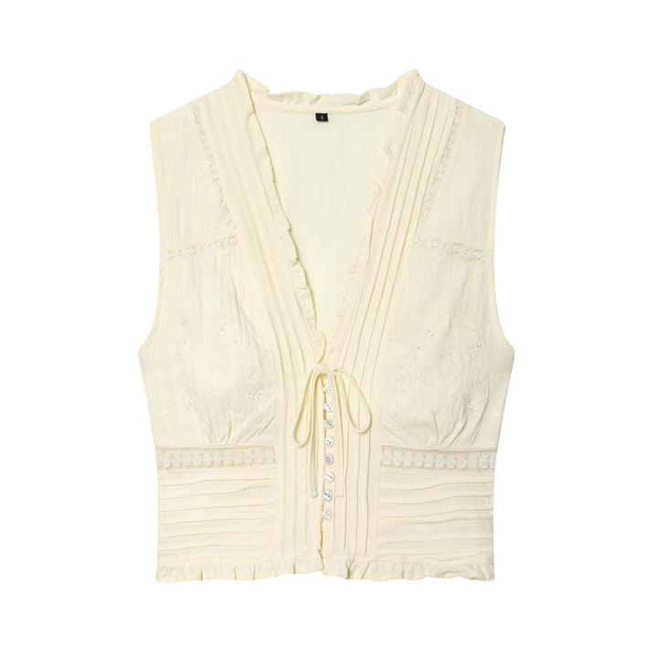 Dame Blusenshirt med fin drapering og dekorative knapdetaljer Skovae