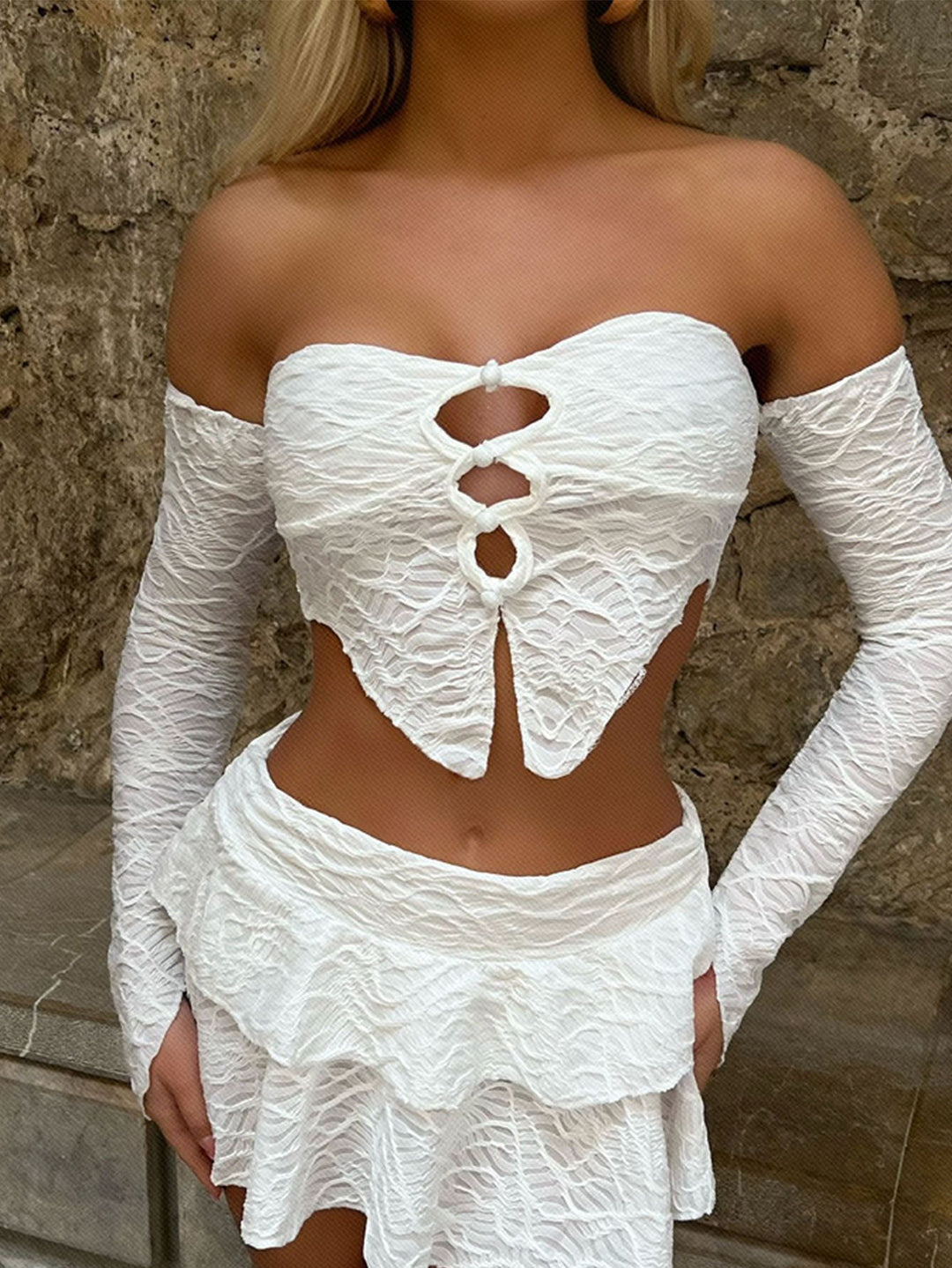 Dame cropped top med unikt knude design og raffinerede ærmer Skovae