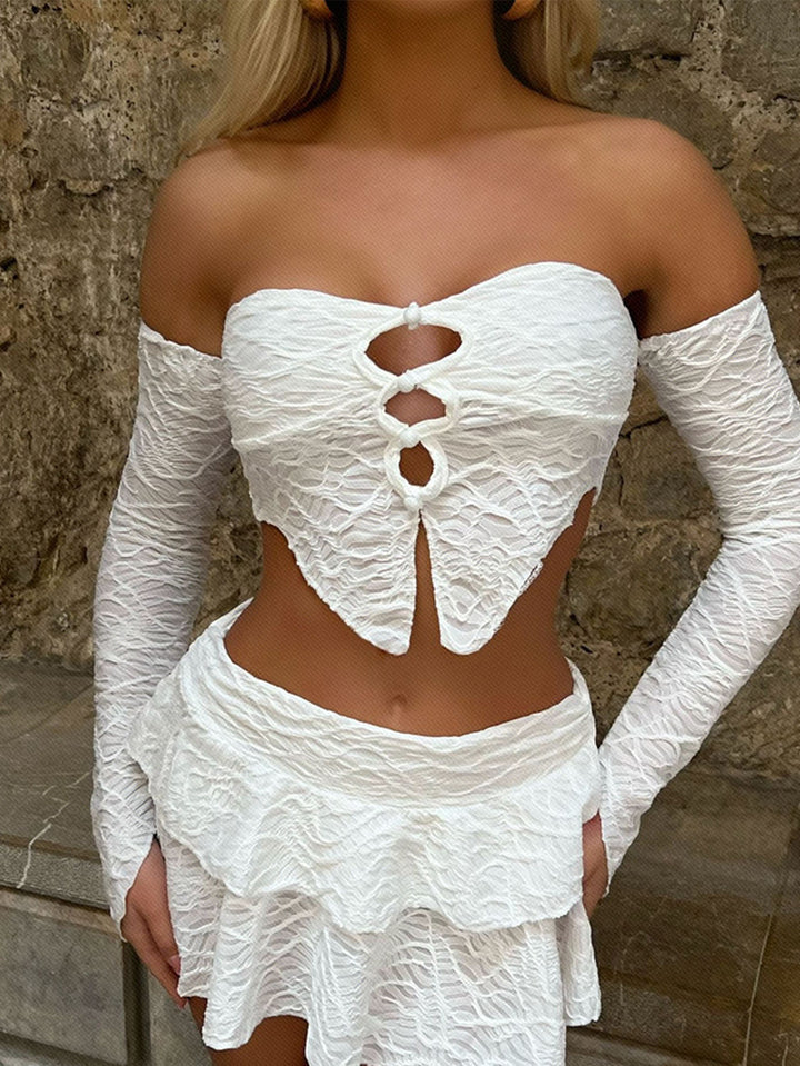 Dame cropped top med unikt knude design og raffinerede ærmer Skovae