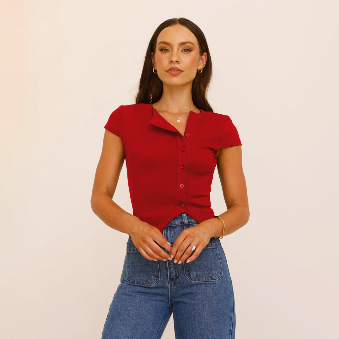 Dame kortærmet bluse top med unik knapliste og struktureret design Stilla