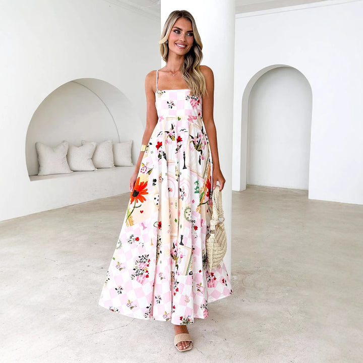 Kvinders maxi kjole med elegante stropper og blomstrede accenter Stilla