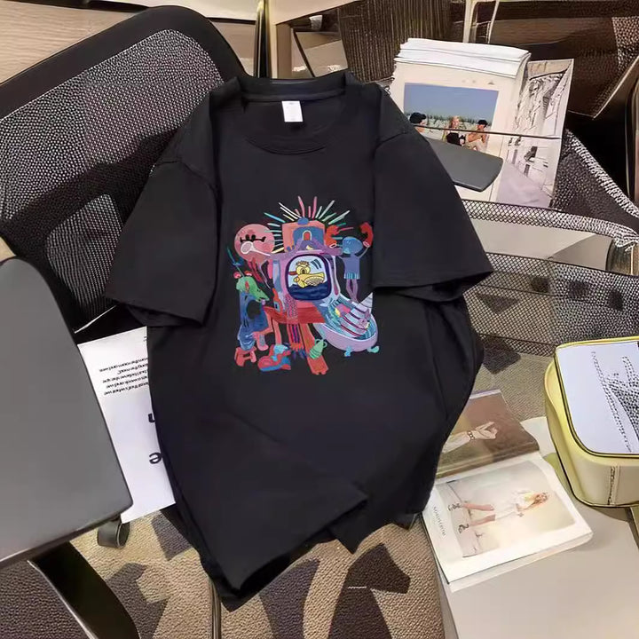 Dame T-shirt med kreativt comic-motiv og oversized snit Stilla