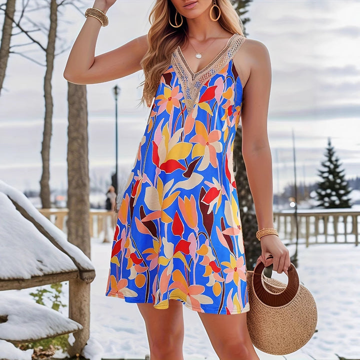 Dame sommerkjole i afslappet boho-stil med unikt fjer-design Stilla