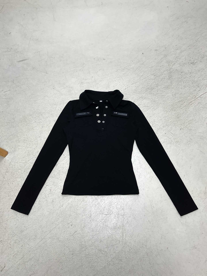 Dame polo shirt med stilfulde lommer og elegante trykknapper Skovae
