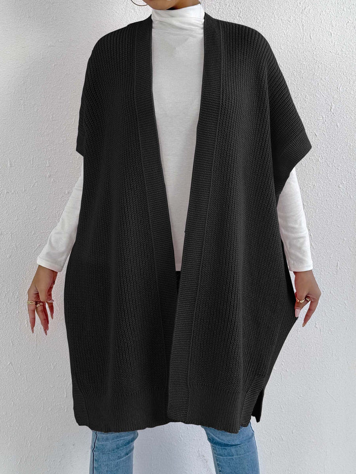 Dame strikjakke i afslappet oversized stil med åben front og sideslids Stilla