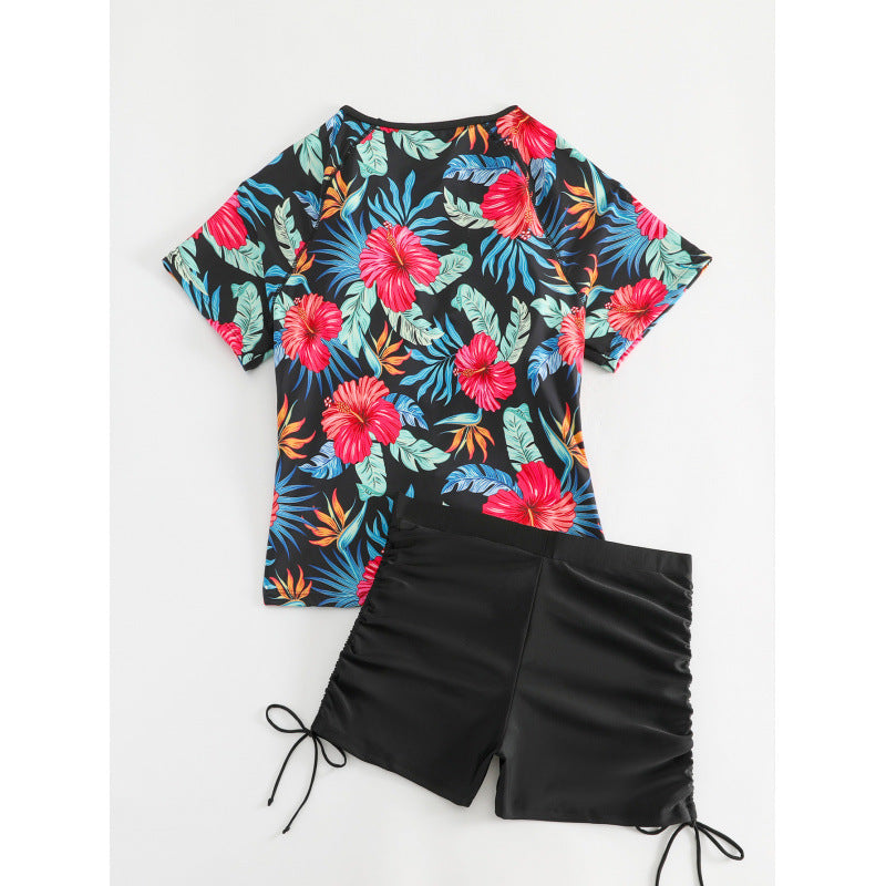 Dame Surf-badehnit-sæt med blomsteret kortærmet overdel og komfortable shorts Skovae