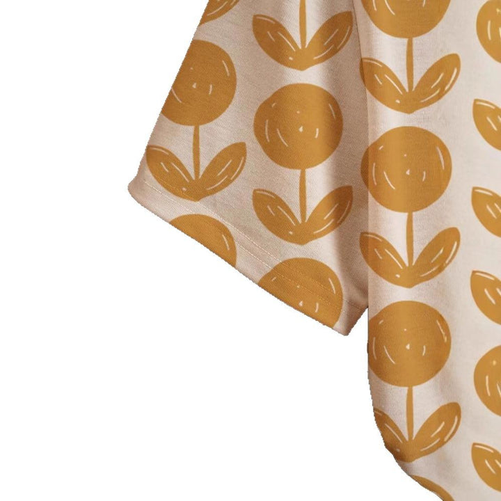 Dame T-shirt med blomstret print i trendy design Stilla