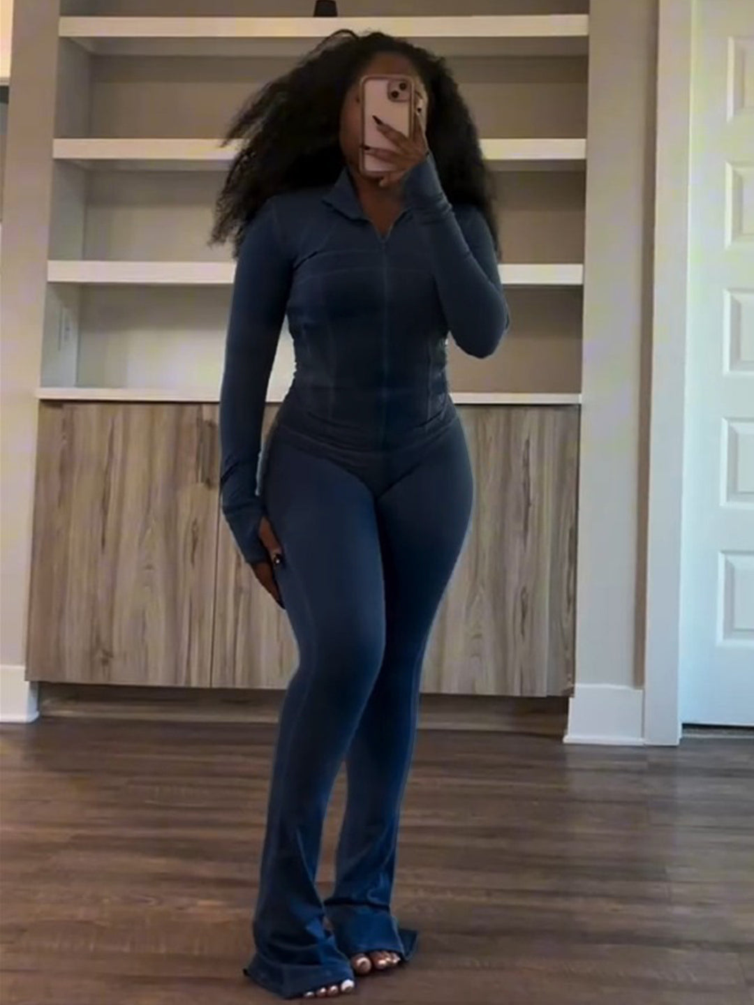 Damer Sporty Langeærmet Jumpsuit i Stretch-materiale med Lynlås Stilla