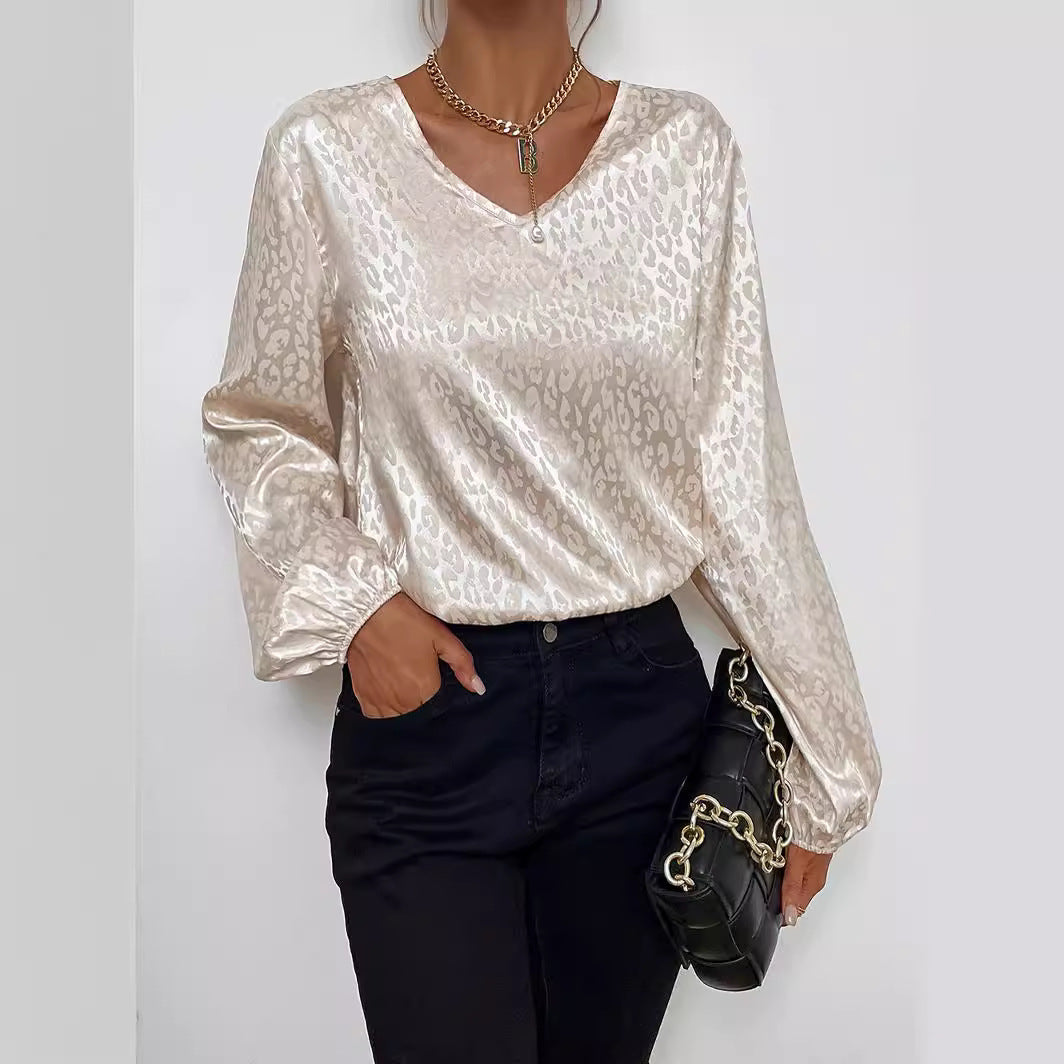 Kvinders elegante bluse top med V-hals og voluminøse ærmer Stilla
