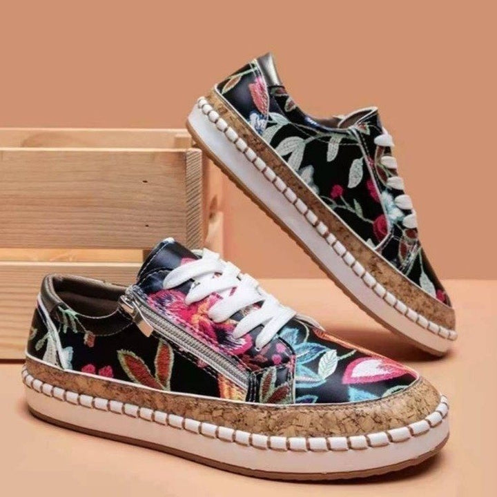 Dame modische sneakers med floral design og praktisk lynlås Stilla