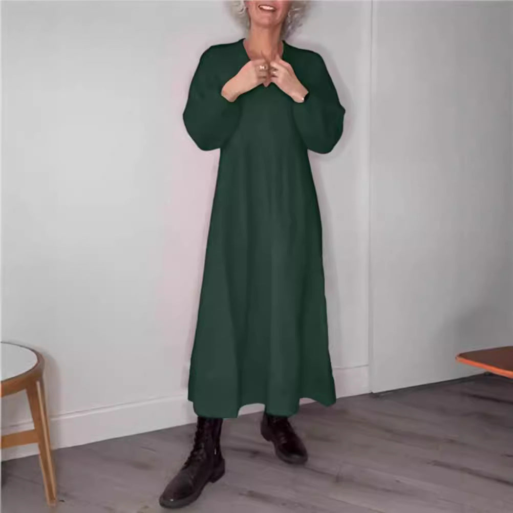 Dame maxikjole med løs pasform og elegant V-hals design Stilla