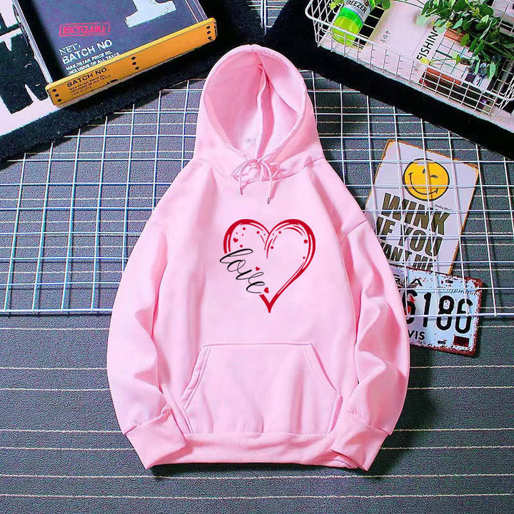 Kvinders hoodie med kreativ hjerteprint og blød indvendig foring Skovae