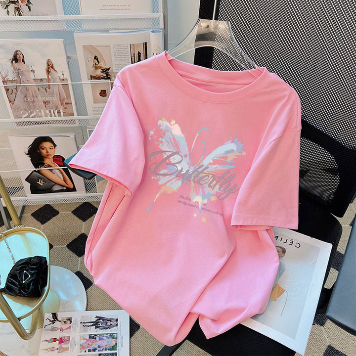 Dame T-shirt med kunstnerisk sommerfugletryk og inspirerende tekst Stilla