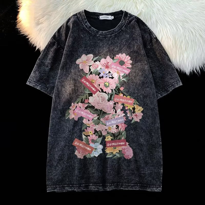 Dame Oversized T-shirt med floral grafisk tryk og afslappet snit Stilla