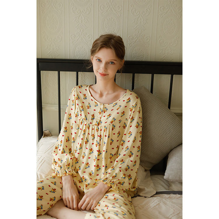 Dame natbluse med legende børne-design og knappesupplies top Stilla