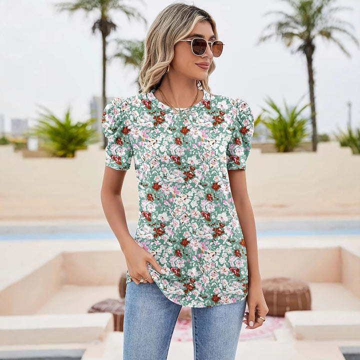 Damebluse med pufærmer og blomstermønster Stilla