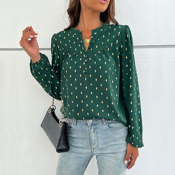 Damebluse med fint print og knapdetaljer Stilla