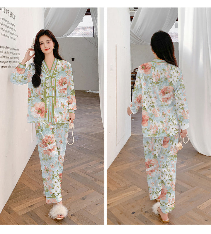 Dame modernt pyjamasæt med tropisk print og komfortdetaljer Stilla