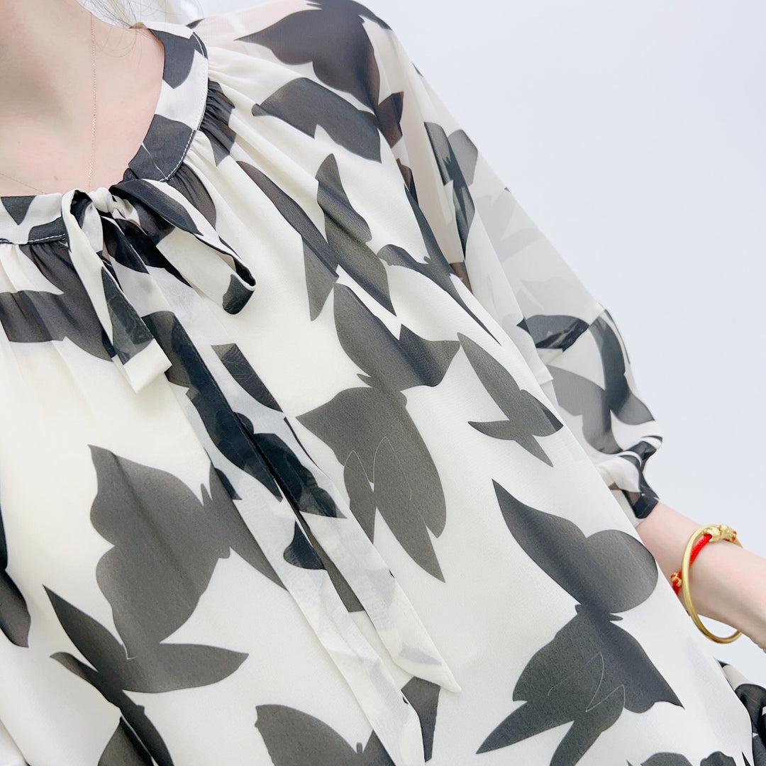 Dame chiffonbluse med elegant sløjfe krave og blomster mønster Stilla