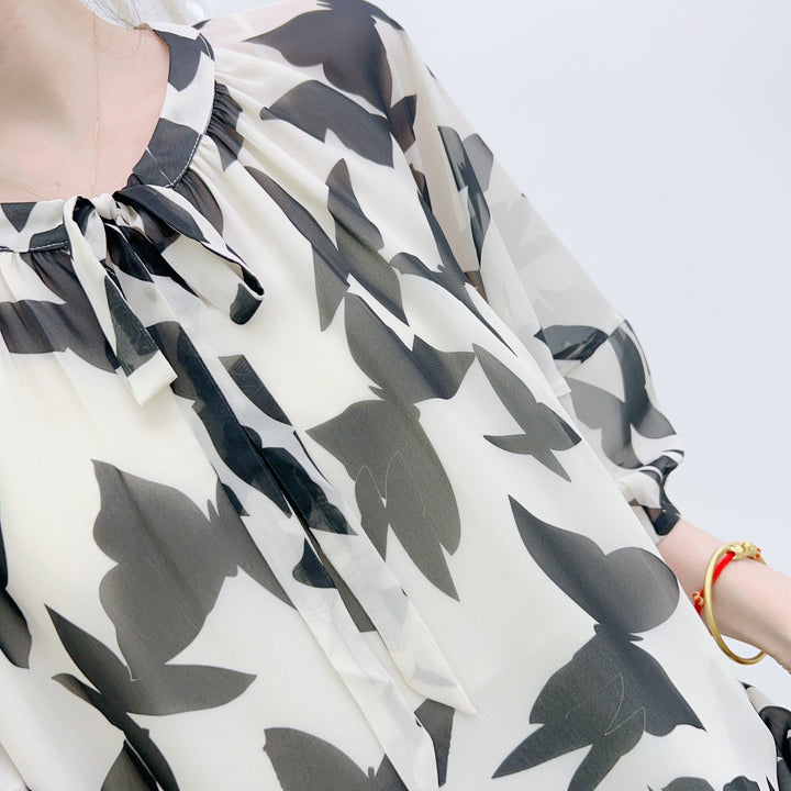 Dame chiffonbluse med elegant sløjfe krave og blomster mønster Stilla