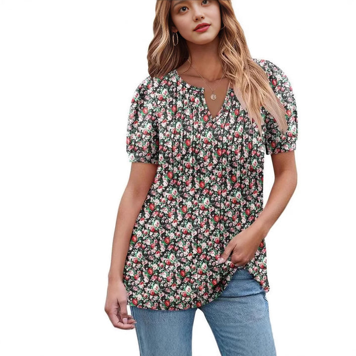 Damebluse med flæseærmer og blomsterdesign Stilla