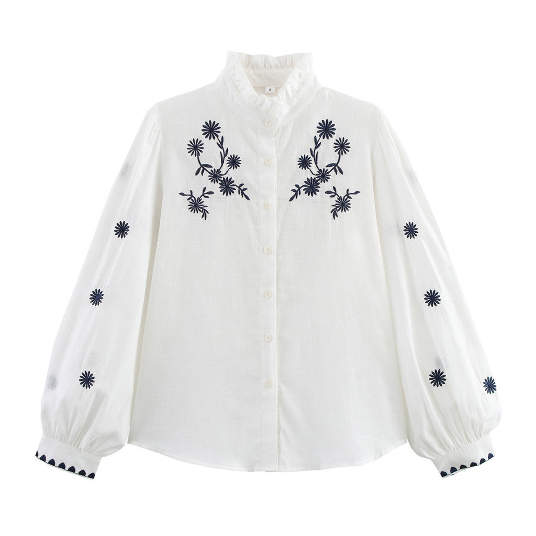 Damebluse med blomsterbroderi og høje pufærmer Stilla
