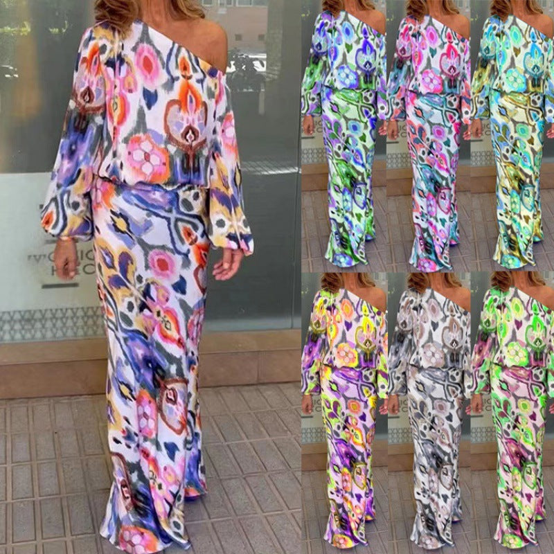 Dame maxikjole med asymmetrisk snit og blomsterprint Stilla