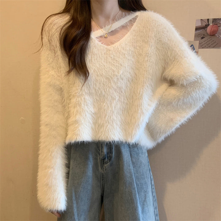 Kvinders fluffy sweater med afslappet skær og dyb V-hals Stilla