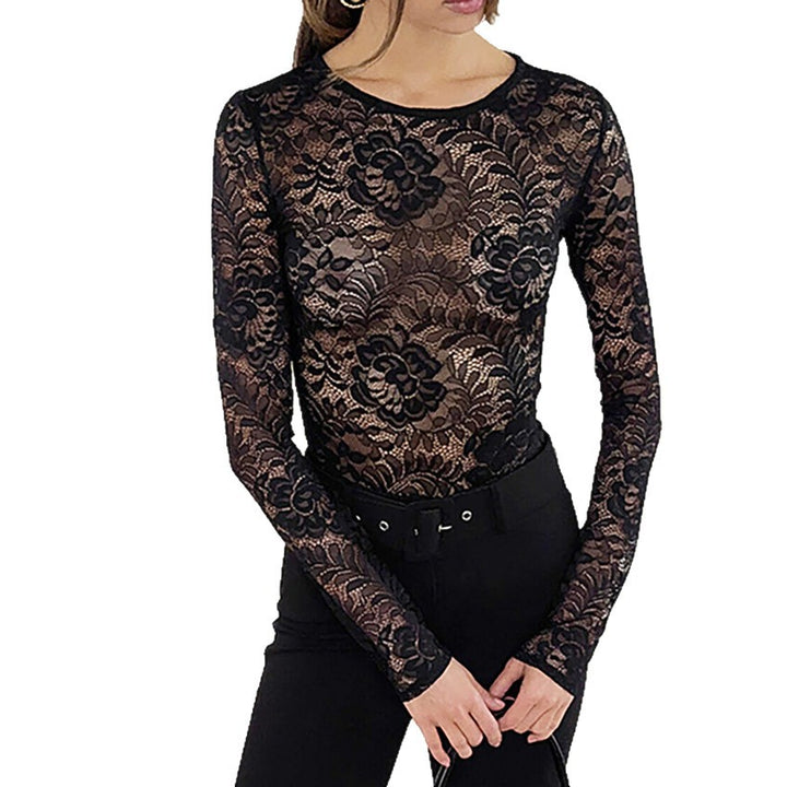 Dame spidsbluse med blomstret design og figursyet snit Stilla