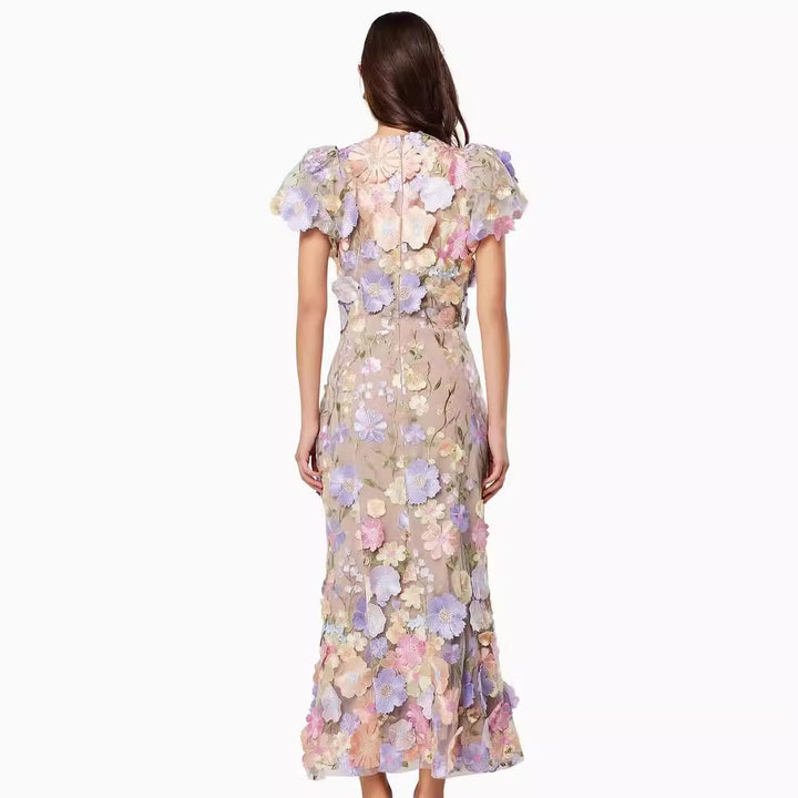 Dame Elegant blomsterkjole med transparent tyl og voluminøse pufærmer Stilla