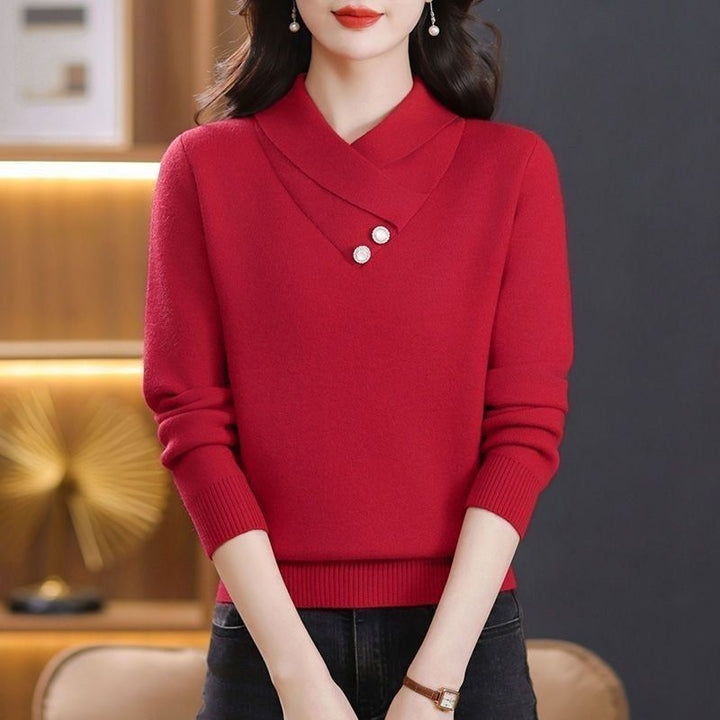 Dames elegant strikket pullover med chic V-hals og dekorative knapdetaljer Stilla
