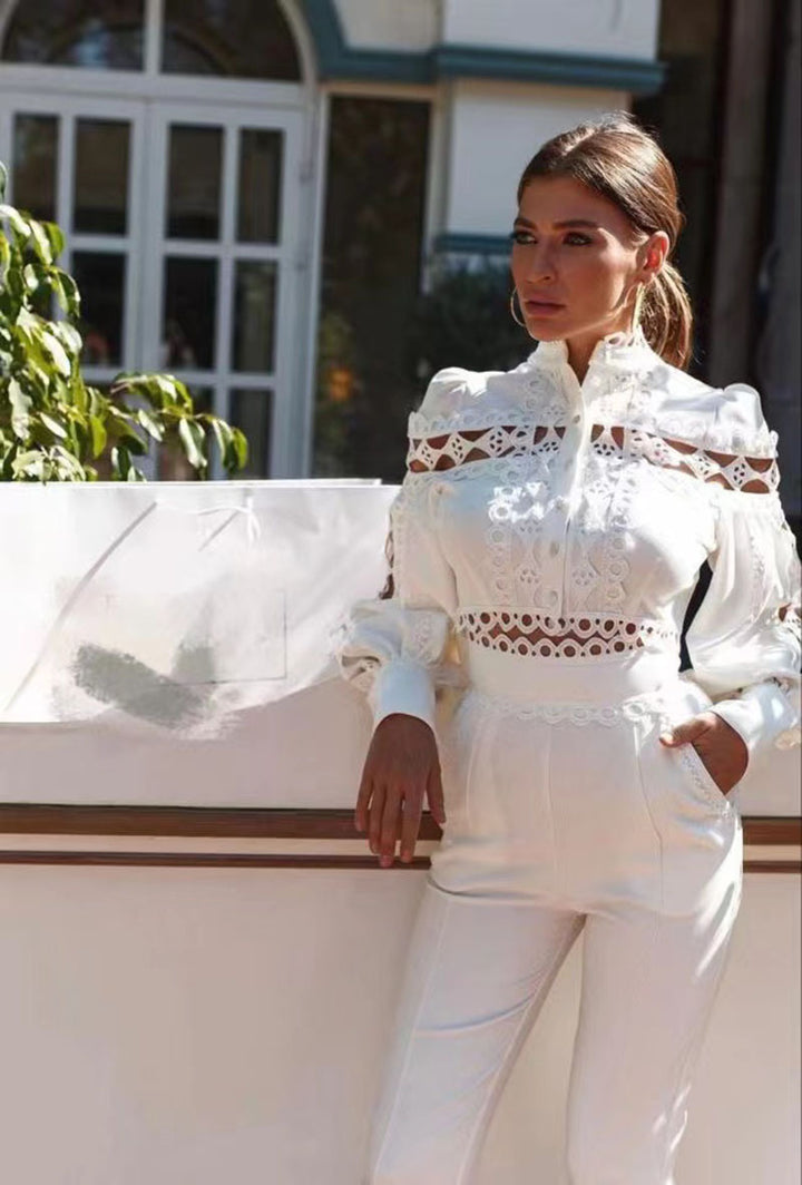Dame jumpsuit med elegante cut-outs og voluminøse ærmer Stilla