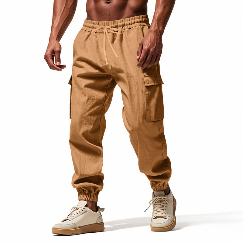 Herrer nan konisk skrånende joggere i utilitarisk stil med elastisk talje, snøre og klaplommer Skovae
