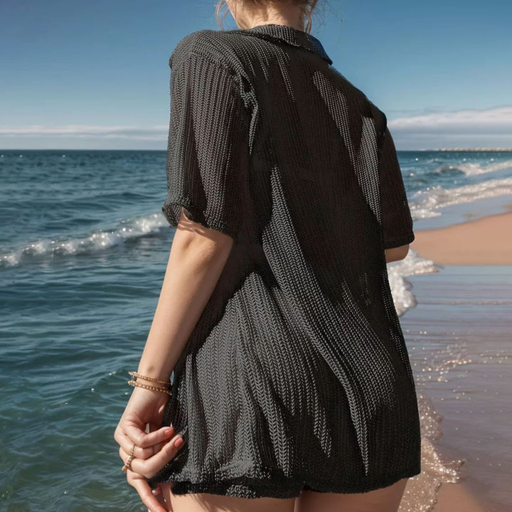 Dame luftig strand-outfit med åben jakke og shorts Stilla