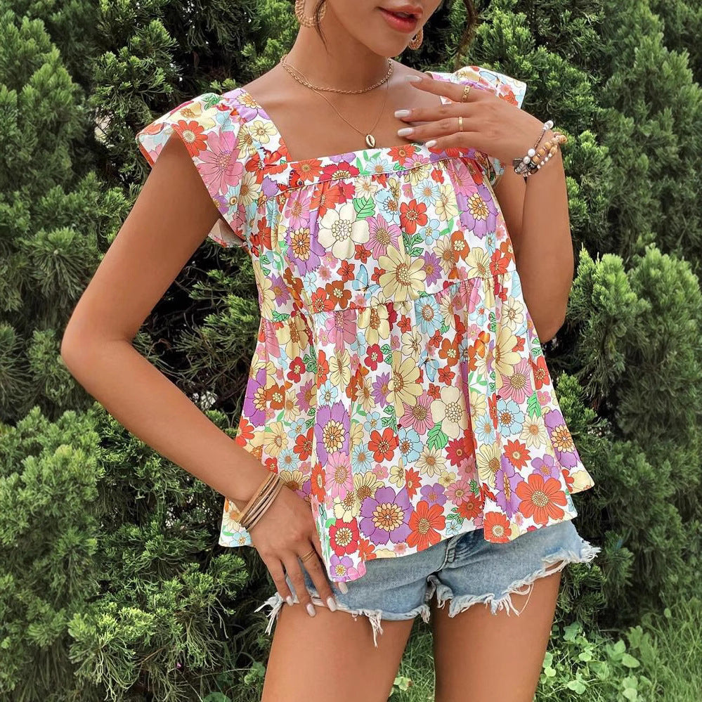 Dame bluse top med floralt print og flæsedetaljer Stilla