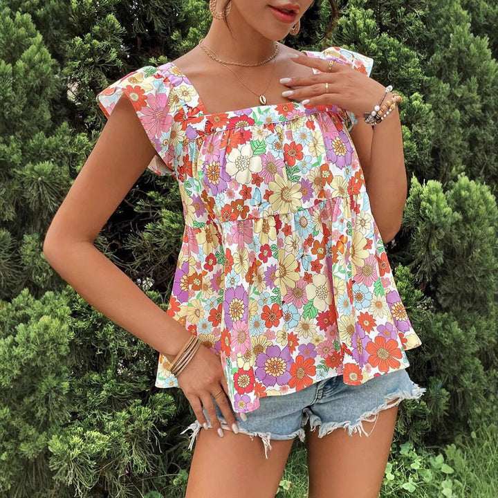 Dame bluse top med floralt print og flæsedetaljer Stilla