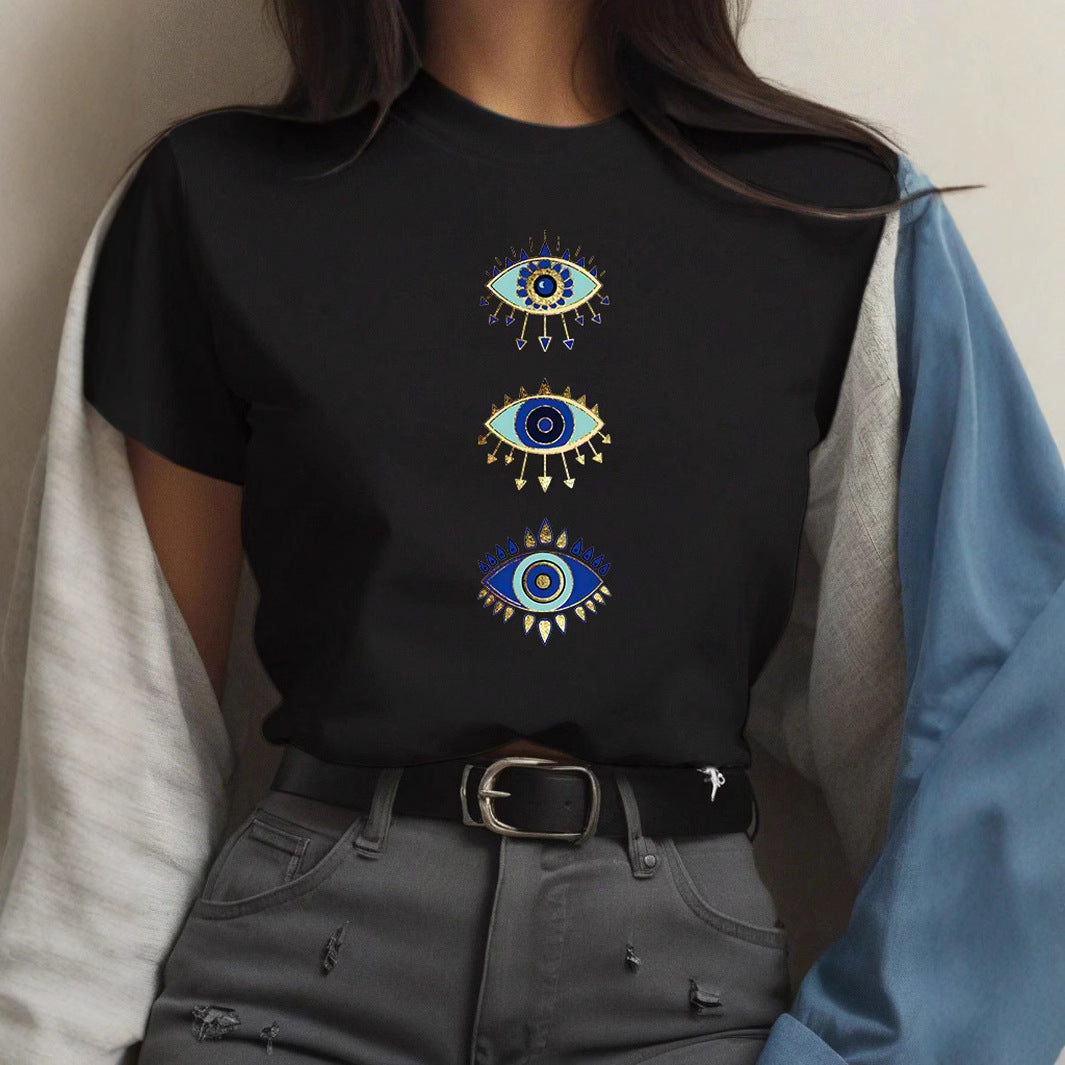 Dame T-shirt med kreativ grafisk tryk og luksuriøse paillet accenter Skovae
