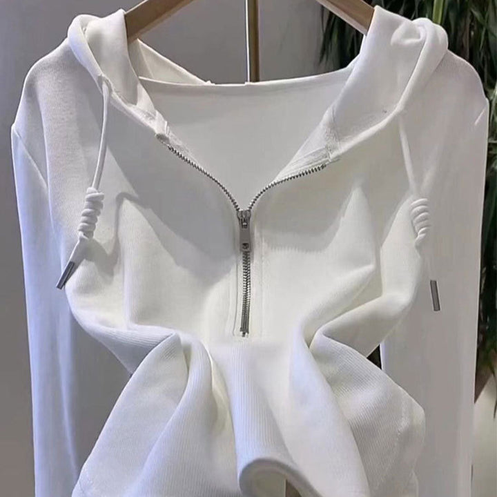 Kvinders afslappede hoodie med halvlange lynlås og moderne snit Stilla