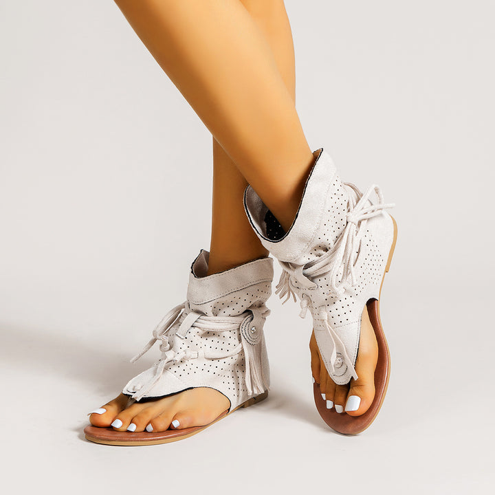 Dame sål sandaler med fashionable frynser og perforeret design Stilla