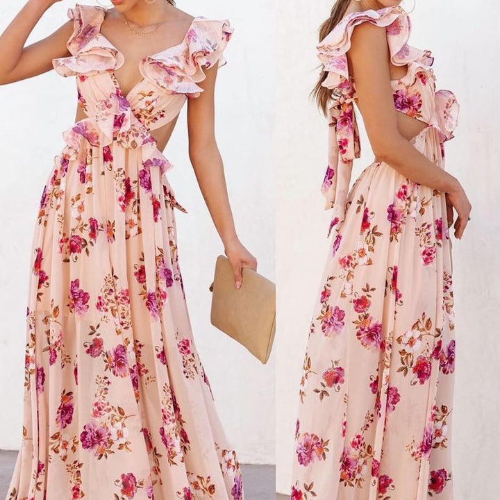 Dame maxikjole med voluminøse flæser og blomsterdesign Stilla