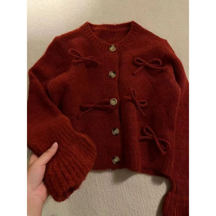 Kvinders cardigan med dekorative sløjfer på